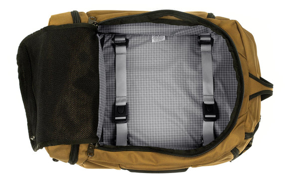 An open Techonaut 30 with a Coyote (tan) exterior and a Northwest Sky (grey) interior.